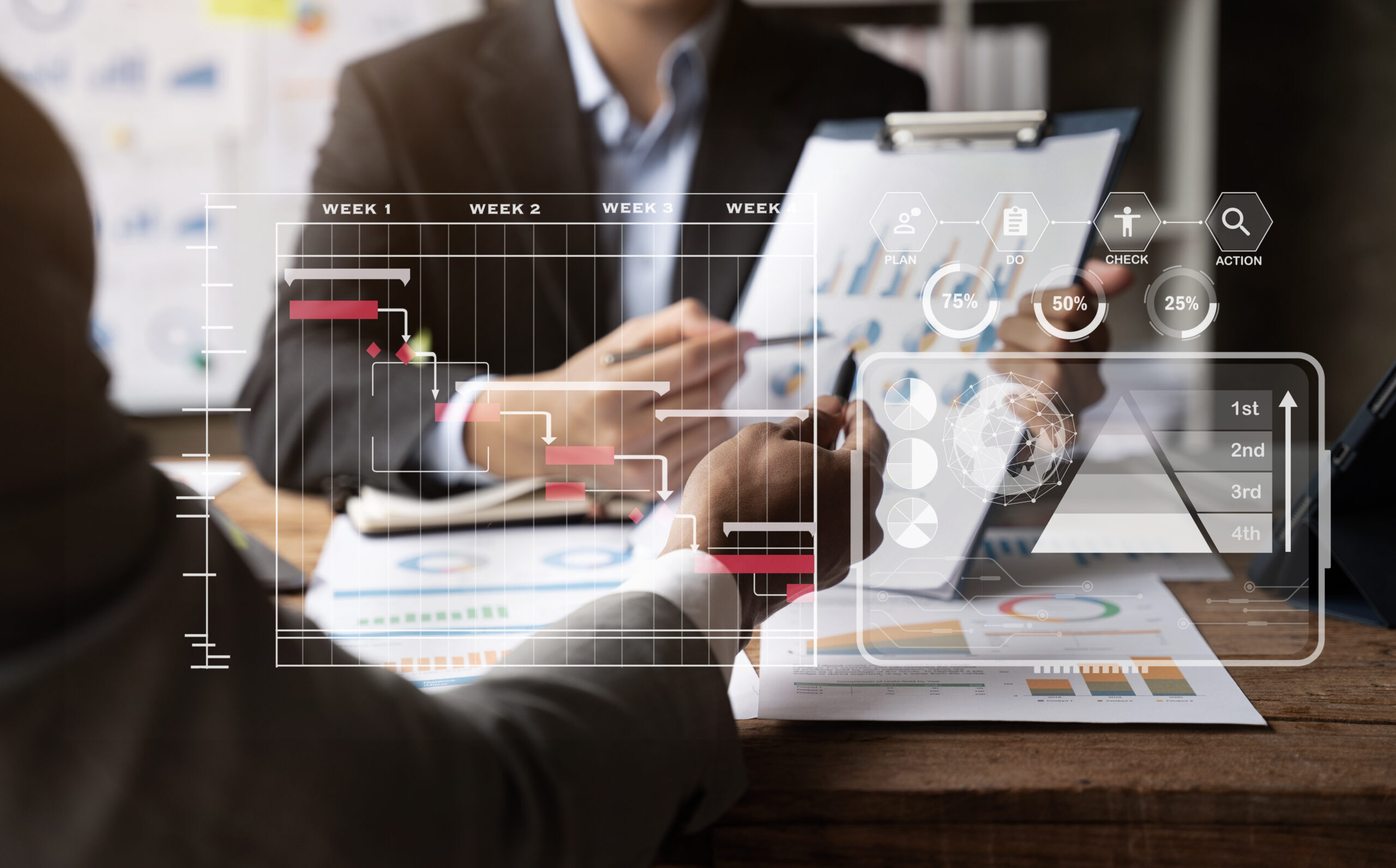 DREP representatives sitting down at a table working